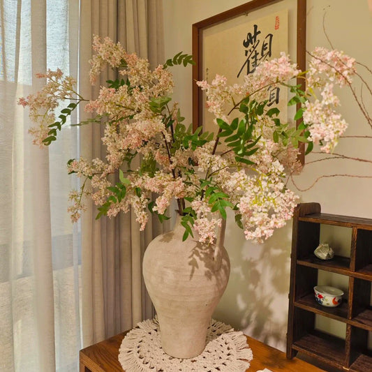 Artificial locust blossom branch with clustered small blooms, light pink color