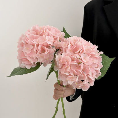 Artificial silk hydrangea stem for table arrangements, orange color