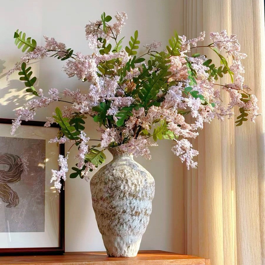 Artificial locust blossom branch with clustered small blooms, purple color