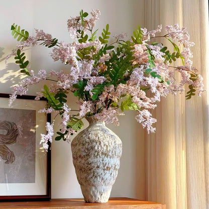 Artificial locust blossom branch with clustered small blooms, purple color
