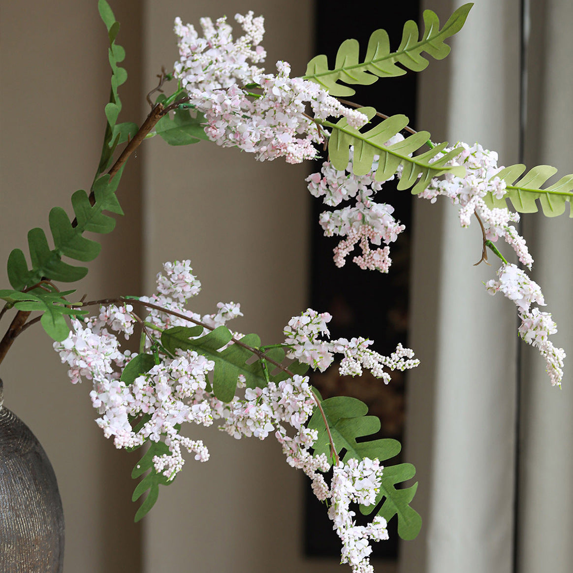 Artificial locust blossom branch with clustered small blooms