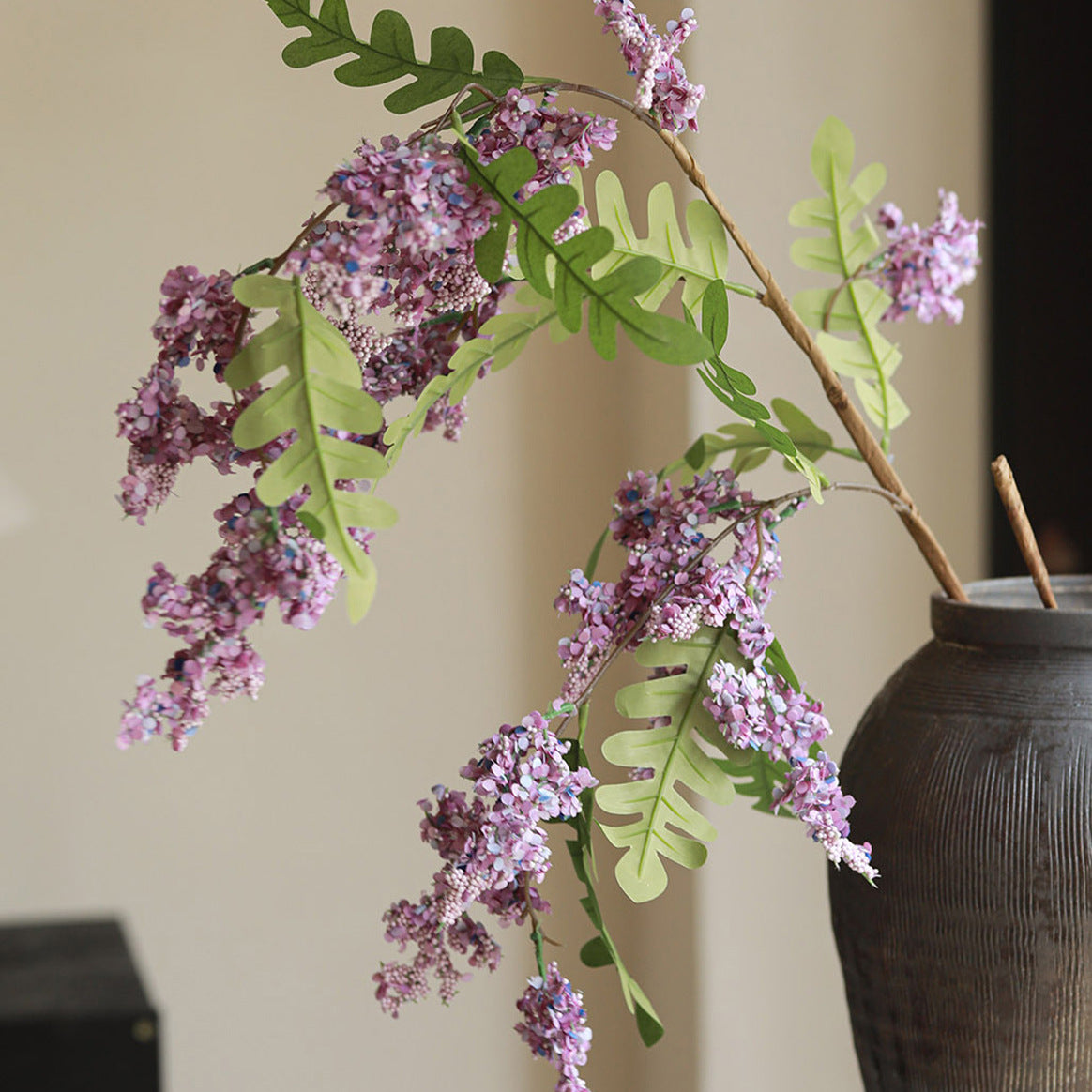 Artificial locust blossom branch with clustered small blooms