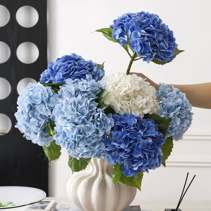 Artificial silk hydrangea stem for table arrangements, light blue color